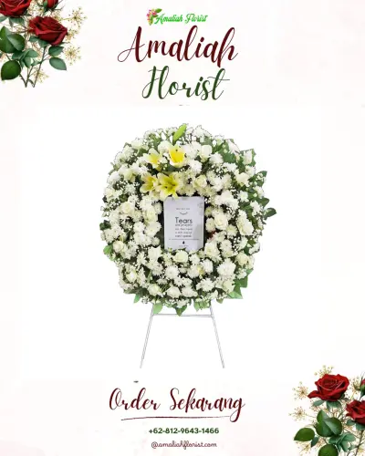 Krans Bunga Duka Cita batu ampar